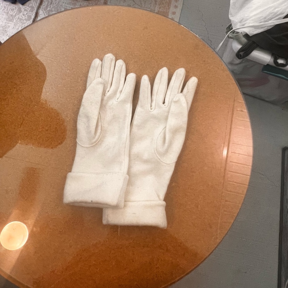 20% off listed price. Women’s cloth dress gloves. Used